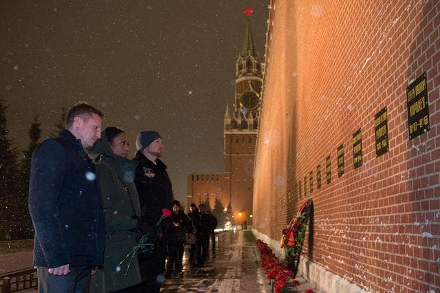 NASA image: jsc2017e136057 - On a snowy night at Red Square Moscow, Expedition 54-55 backup crewmembers Sergey Prokopyev of the Russian Federal Space Agency (Roscosmos, left), Jeanette Epps of NASA (center) and Alexander Gerst of the European Space Agency (right) pay