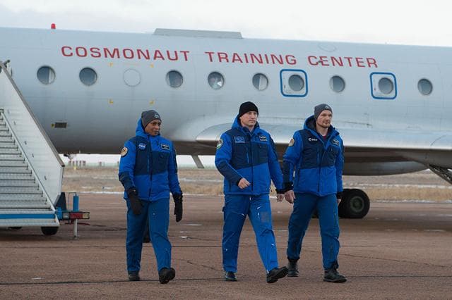 NASA image: jsc2017e136096 - Expedition 54-55 backup crewmembers Jeanette Epps of NASA (left), Sergey Prokopyev of the Russian Federal Space Agency (Roscosmos, center) and Alexander Gerst of the European Space Agency (right) arrive at the launch site at the Baikonur 