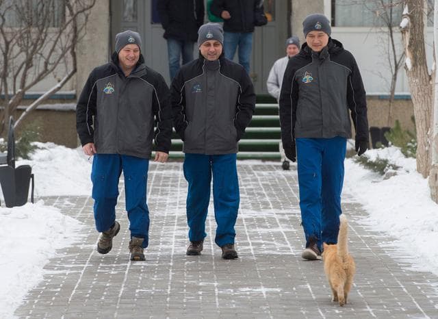 NASA image: jsc2017e137336 - At their Cosmonaut Hotel crew quarters in Baikonur, Kazakhstan, Expedition 54-55 prime crewmembers Scott Tingle of NASA (left), Anton Shkaplerov of the Russian Federal Space Agency (Roscosmos, center) and Norishige Kanai of the Japan Aero