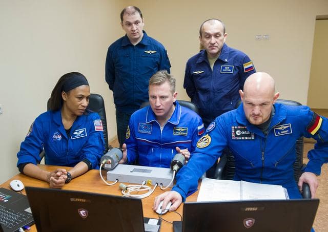 NASA image: jsc2017e137340 - At their Cosmonaut Hotel crew quarters in Baikonur, Kazakhstan, Expedition 54-55 backup crewmembers Jeanette Epps of NASA (left), Sergey Prokopyev of the Russian Federal Space Agency (Roscosmos, center) and Alexander Gerst of the European