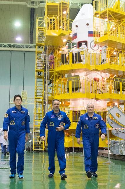 NASA image: jsc2017e138122 - At the Integration Facility at the Baikonur Cosmodrome in Kazakhstan, Expedition 54-55 prime crewmembers Norishige Kanai of the Japan Aerospace Exploration Agency (JAXA, left), Anton Shkaplerov the Russian Federal Space Agency (Roscosmos,