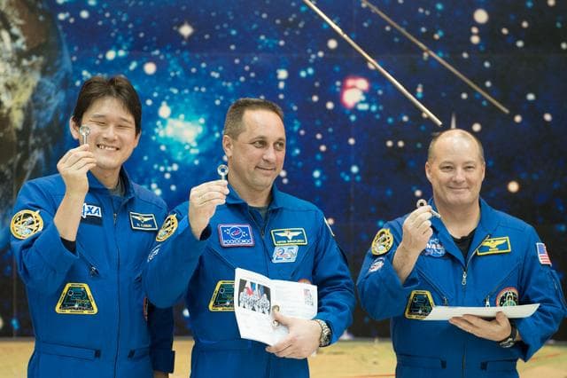 NASA image: jsc2017e138125 - At the Korolev Museum at the Baikonur Cosmodrome in Kazakhstan, Expedition 54-55 prime crewmembers Norishige Kanai of the Japan Aerospace Exploration Agency (JAXA, left), Anton Shkaplerov of the Russian Federal Space Agency (Roscosmos, ce
