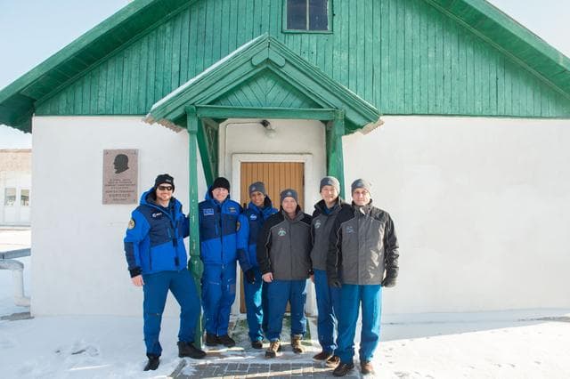 NASA image: jsc2017e138127 - At the Baikonur Cosmodrome in Kazakhstan, the Expedition 54-55 prime and backup crewmembers pose for pictures Dec. 13 in front of the cottage where the iconic Russian space designer Sergey Korolev slept on the night before Yuri Gagarin la
