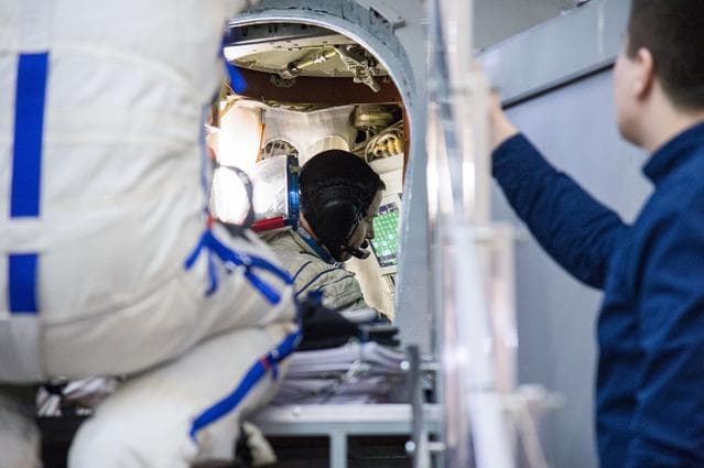 NASA image: Nick Hague of NASA inside a Soyuz spacecraft simulator