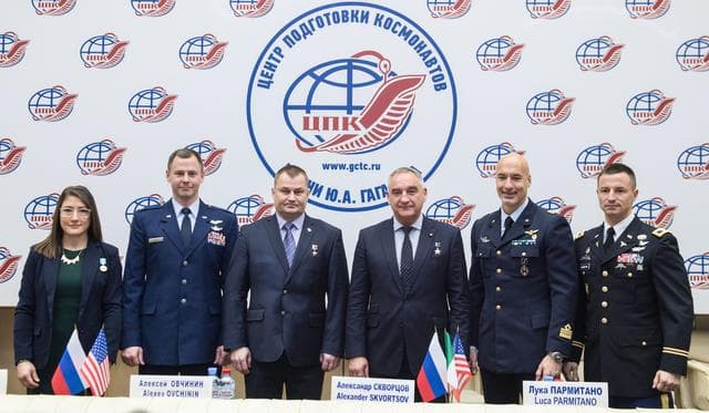 NASA image: jsc2019e004422 - At the Gagarin Cosmonaut Training Center in Star City, Russia, the Expedition 59 prime and backup crewmembers pose for pictures Feb. 21 following a pre-launch news conference. From left to right are the prime crewmembers, Christina Koch a
