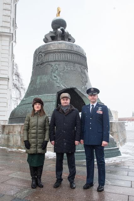NASA image: jsc2019e004438 - Inside the Kremlin in Moscow, Expedition 59 crewmembers Christina Koch of NASA (left), Alexey Ovchinin of Roscosmos (center) and Nick Hague of NASA (right) pose for pictures in front of the Tsar Bell on a wintry day Feb. 21 as part of the