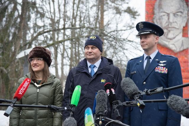 NASA image: At the Gagarin Cosmonaut Training Center in Star City, Russia, Expedition 59 crewmembers Christina Koch of NASA (left), Alexey Ovchinin of Roscosmos (center) and Nick Hague of NASA (right) listen to reporters’ questions Feb. 26 as they prepared to depar