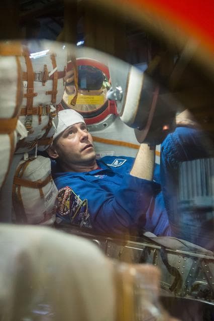 NASA image: jsc2019e009944 - At the Baikonur Cosmodrome in Kazakhstan, Expedition 59 crewmember Nick Hague of NASA works inside the Soyuz MS-12 spacecraft Feb. 27 during pre-launch training. Hague, Christina Koch of NASA and Alexey Ovchinin of Roscosmos will launch M
