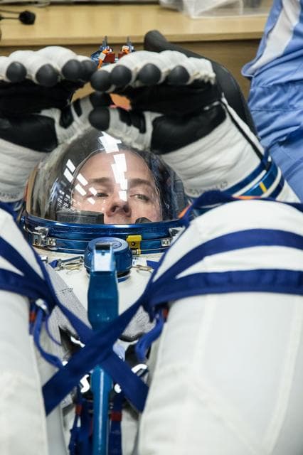 NASA image: jsc2019e009950 - At the Baikonur Cosmodrome in Kazakhstan, Expedition 59 crewmember Nick Hague of NASA undergoes a Sokol launch suit pressure check Feb. 27 during pre-launch training. Hague, Christina Koch of NASA and Alexey Ovchinin of Roscosmos will lau