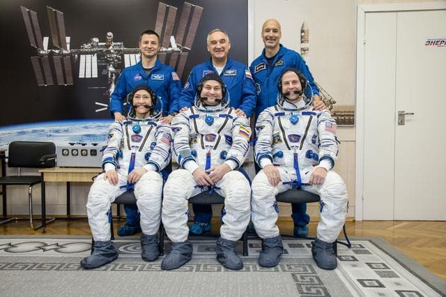 NASA image: jsc2019e009955 - At the Baikonur Cosmodrome in Kazakhstan, the Expedition 59 prime and backup crewmembers pose for pictures Feb. 27 as part of their pre-launch training. In the front row are the prime crewmembers, Christina Koch of NASA, Alexey Ovchinin o