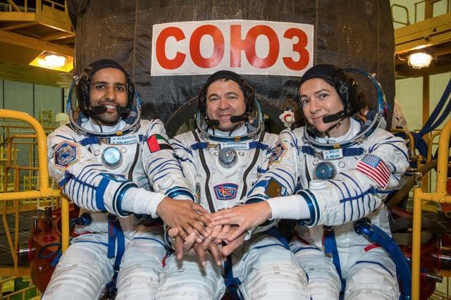 NASA image: jsc2019e052892 - In the Integration Building at the Baikonur Cosmodrome in Kazakhstan, spaceflight participant Hazzaa Ali Almansoori of the United Arab Emirates (left) and Expedition 61 crewmates Oleg Skripochka of Roscosmos (center) and Jessica Meir of N