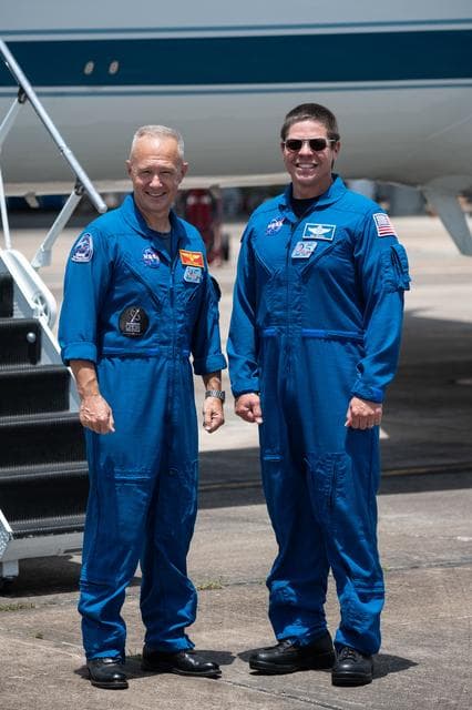 NASA image: jsc2020e023069 - At Ellington Field near NASA’s Johnson Space Center in Houston, astronauts Douglas Hurley(left) and Robert Behnken pose for a photo before boarding the Gulfstream jet that will carry them to the agency’s Kennedy Space Center in Florid