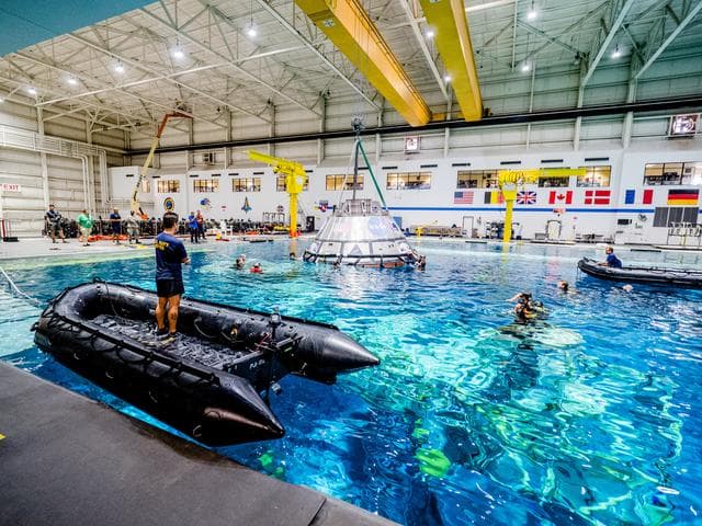 NASA image: US Navy Divers practice recovery operations at JSC