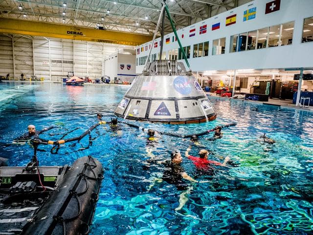 NASA image: US Navy Divers practice recovery operations at JSC