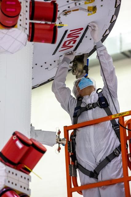 NASA image: NASA and ESA logo installation on Artemis I spacecraft