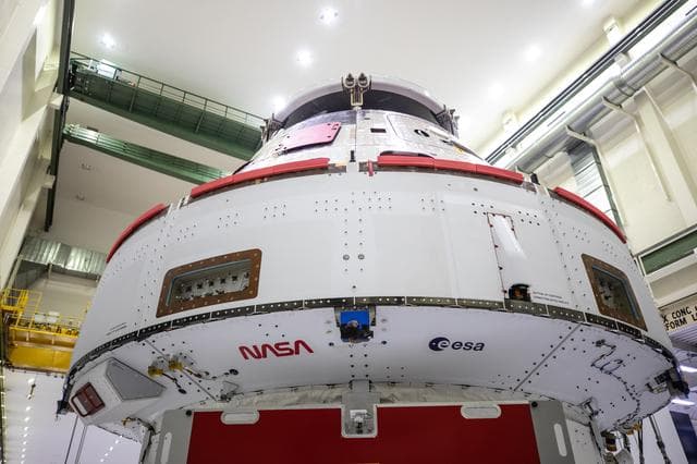 NASA image: NASA and ESA logo installation on Artemis I spacecraft