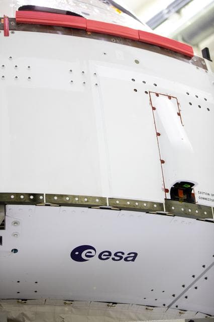 NASA image: NASA and ESA logo installation on Artemis I spacecraft
