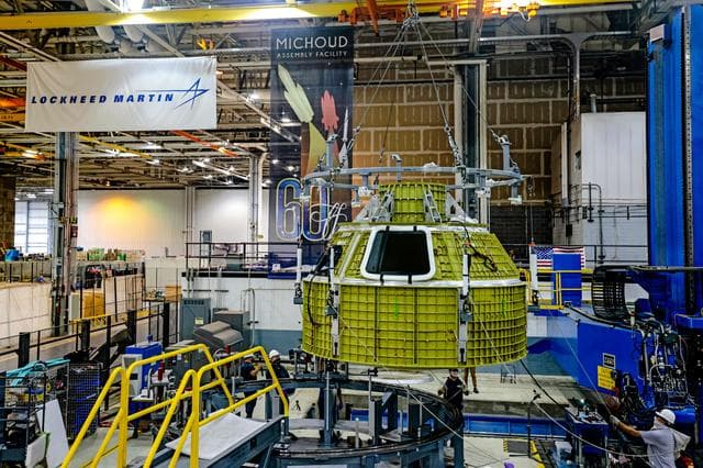 NASA image: Orion crew module pressure vessel lifted from welding tool