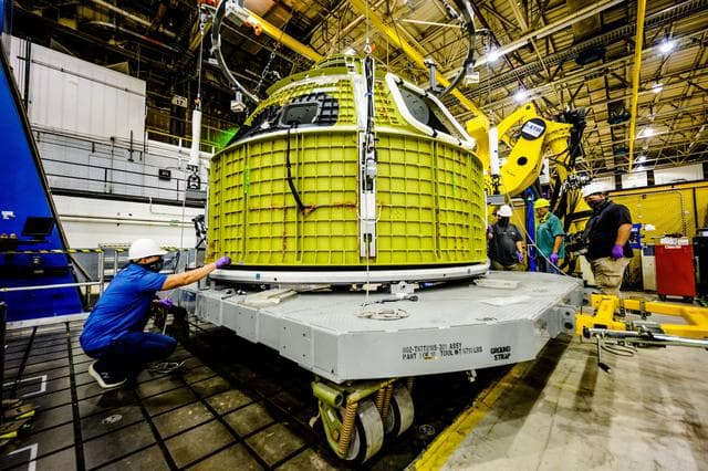 NASA image: Orion crew module pressure vessel lifted from welding tool