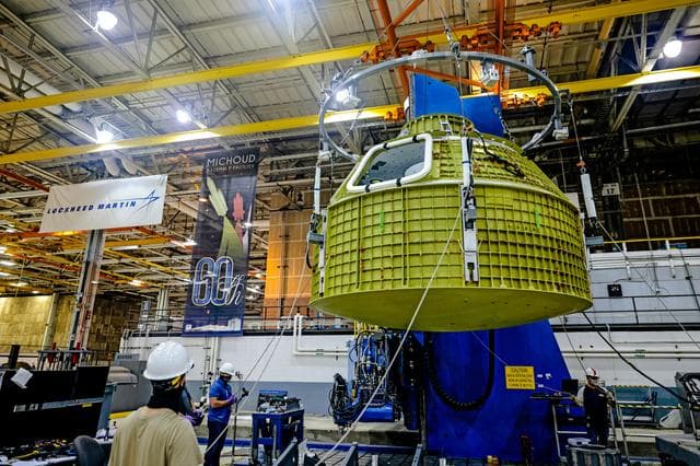 NASA image: Orion crew module pressure vessel lifted from welding tool