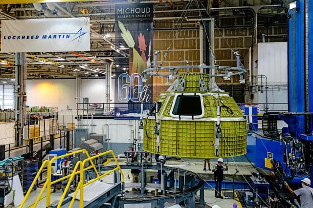 NASA image: Orion crew module pressure vessel lifted from welding tool