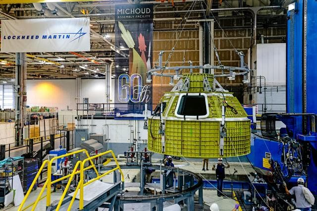NASA image: Orion crew module pressure vessel lifted from welding tool