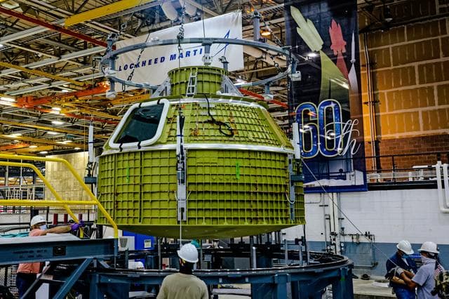 NASA image: Orion crew module pressure vessel lifted from welding tool