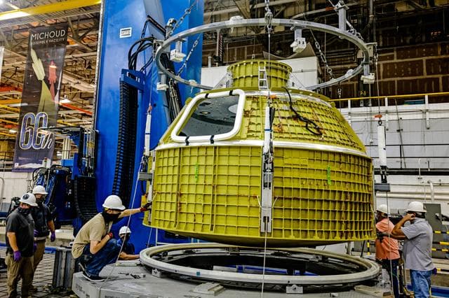 NASA image: Orion crew module pressure vessel lifted from welding tool