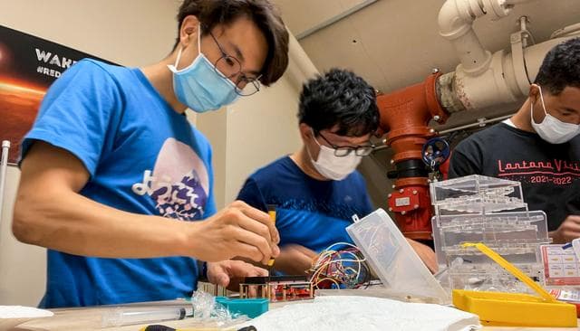 NASA image: Biopolymer Research for In-Situ Capabilities team assembles the control experiments