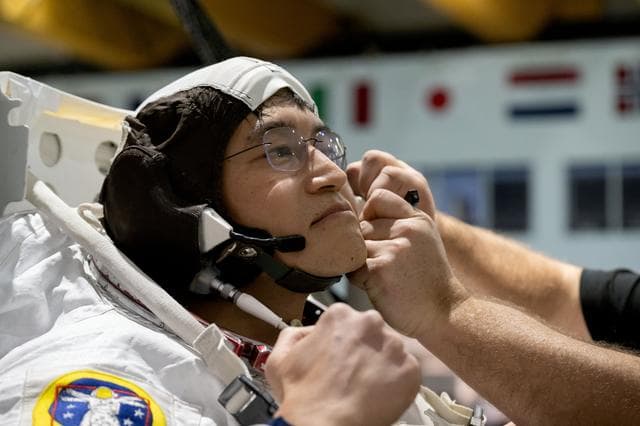 NASA image: Crew-10 NBL ISS EVA Maintenance 1 Suit Up with Nichole Ayers and Takuya Onishi