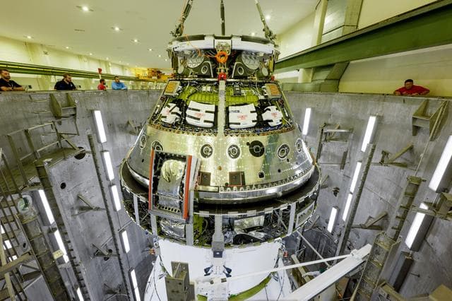 NASA image: Artemis II Orion Spacecraft Lifted into Vacuum Chamber for Second Round of Testing