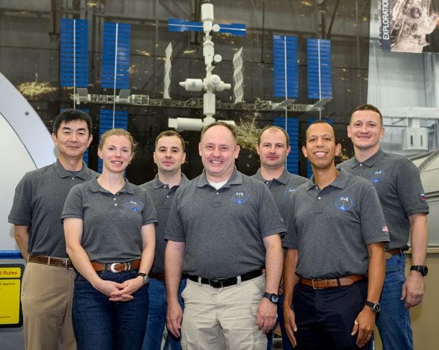 NASA image: The Expedition 74 crew poses for a group photo after a training session