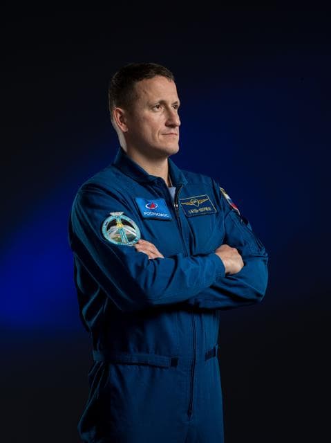 NASA image: Roscosmos cosmonaut Sergey Kud-Sverchkov poses for a portrait at NASA's Johnson Space Center