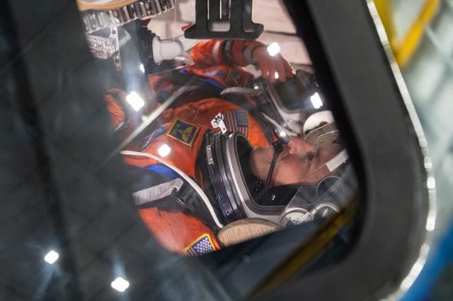 NASA image: NASA astronaut and Artemis II commander Reid Wiseman inside of the Orion spacecraft mockup