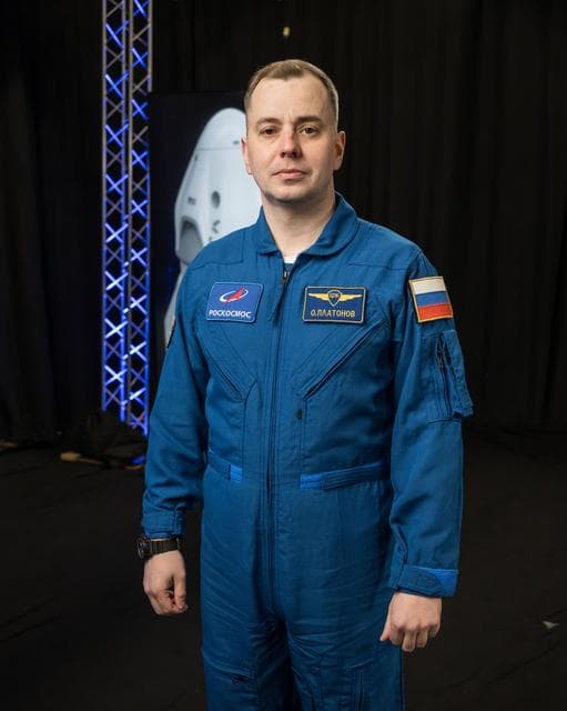 NASA image: Roscosmos cosmonaut Oleg Platonov poses for a photo during an interview