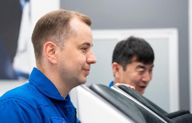 NASA image: Cosmonaut Oleg Platonov trains inside a Dragon training crew spacecraft