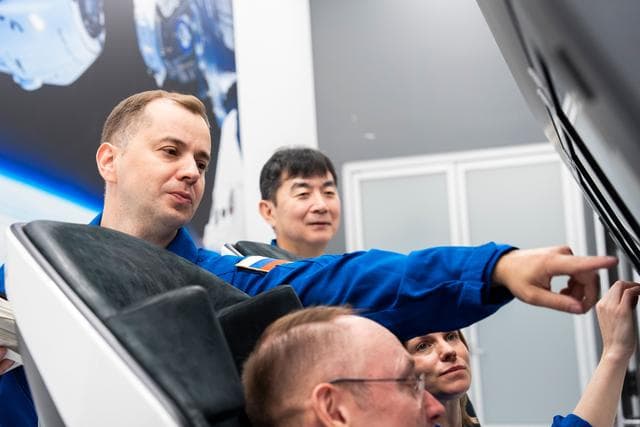 NASA image: NASA's SpaceX Crew-11 members train inside a Dragon training crew spacecraft