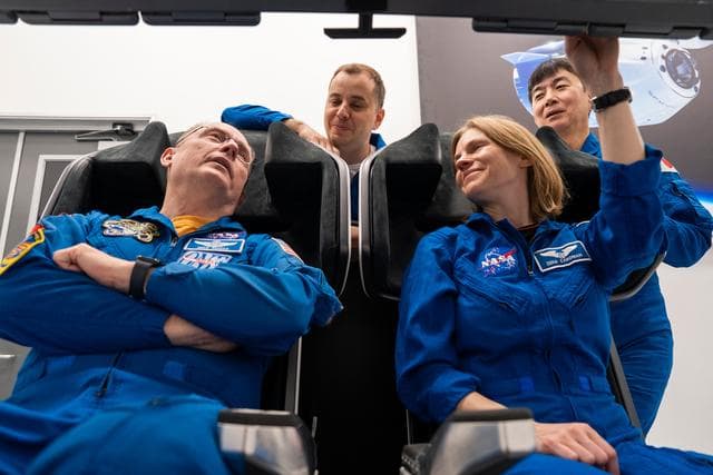 NASA image: NASA's SpaceX Crew-11 members train inside a Dragon training crew spacecraft