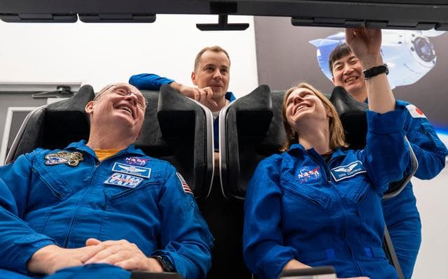 NASA image: NASA's SpaceX Crew-11 members train inside a Dragon training crew spacecraft