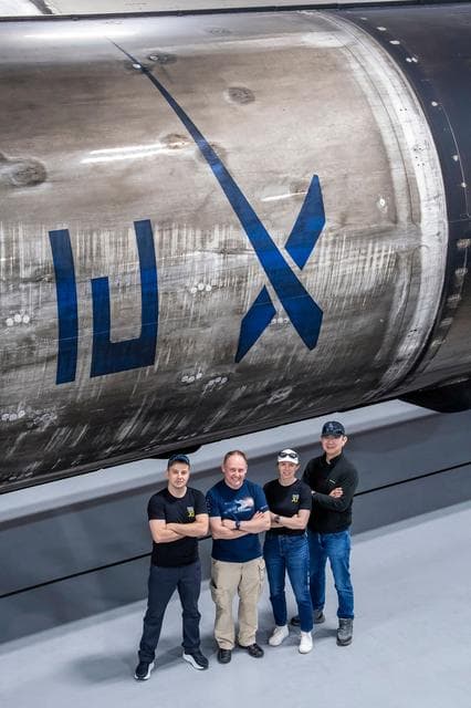 NASA image: NASA's SpaceX Crew-11 members pose for a portrait at SpaceX's Hangar X