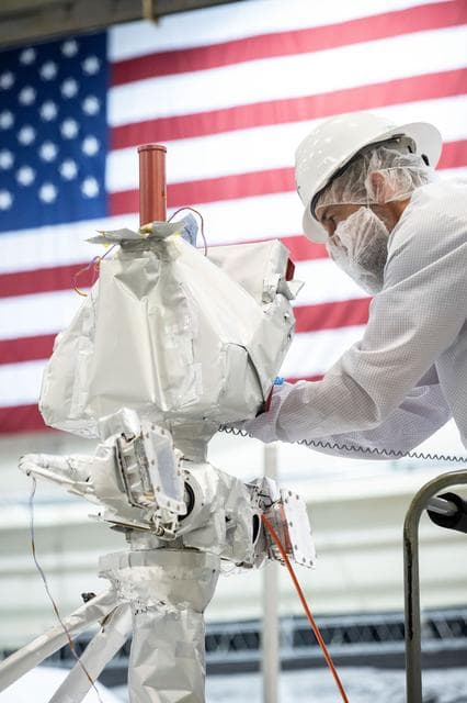 NASA image:  VIPER Vehicle Manager connects cable