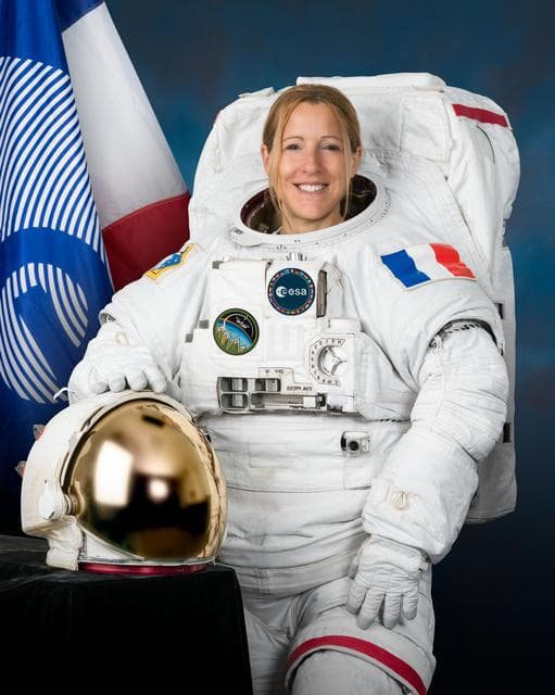 NASA image: Official portrait of ESA (European Space Agency) astronaut Spohie Adenot wearing a spacesuit