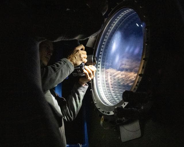 NASA image: NASA astronaut Anil Menon participates in a photography training session
