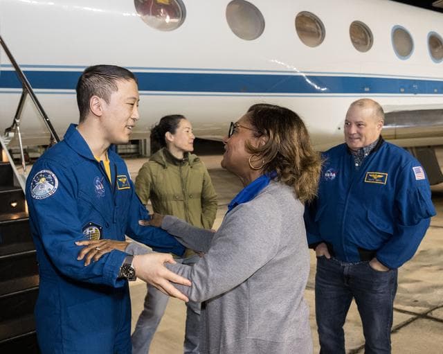 NASA image: NASA astronaut Jonny Kim is greeted by Johnson Space Center Director Vanessa Wyche