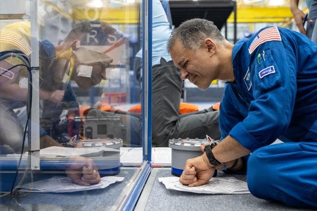 NASA image: NASA astronaut Anil Menon participates in an emergency training session