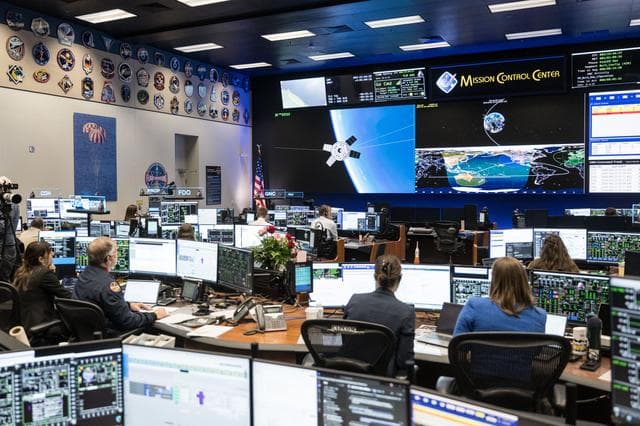 NASA image: The Artemis II Flight Control Team Monitoring the Translunar Injection Burn