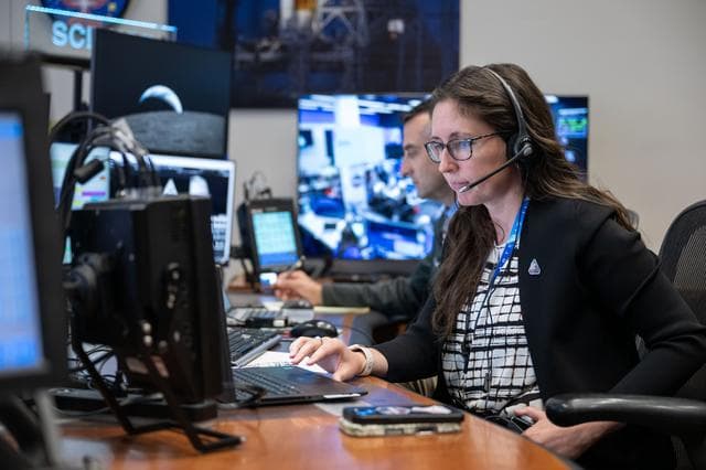 NASA image: Artemis II science officers, Trevor Graff, background, and Kelsey Young -- jsc2026e021212
