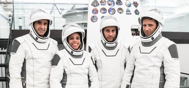 NASA image: The SpaceX Crew-13 members pose for a portrait in their pressure suits