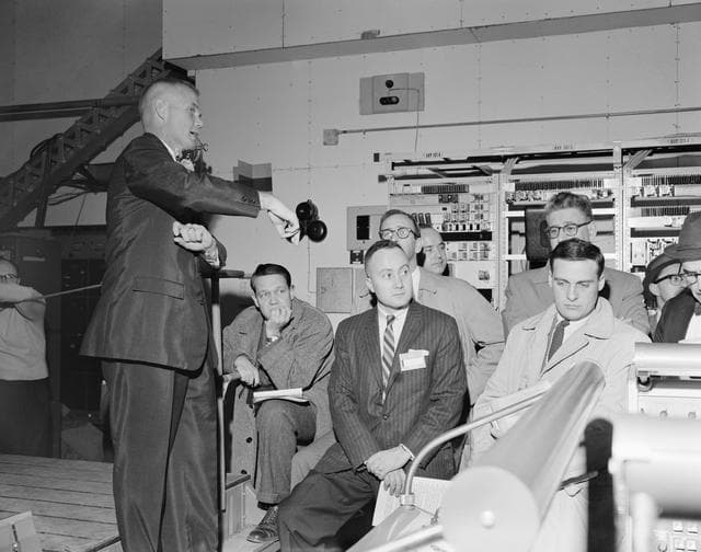 NASA image: Astronaut John Glenn and news media representatives during tour of Cape