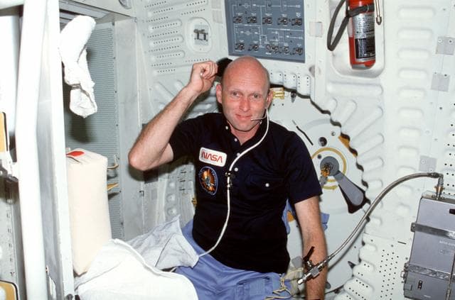 NASA image: Pilot Fullerton uses hairbrush on middeck